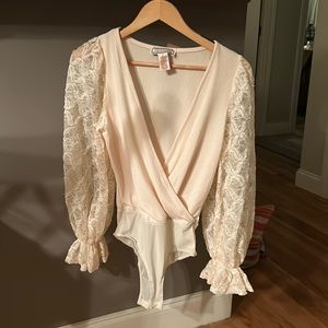 Flying Tomato Bodysuit